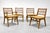 A fabulous find for MCM lovers! This set of four vintage spindle back dining chairs was crafted by the Red Lion Furniture...