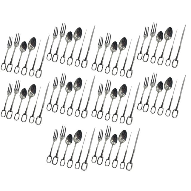 Signed Hermes Attelage Flatware Service for 10. Each 6-place setting includes salad fork, dinner fork, dinner spoon,...