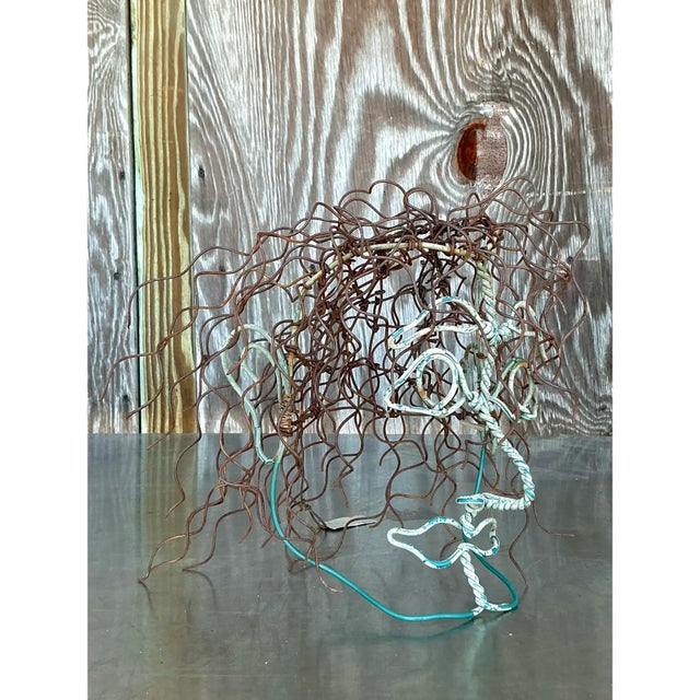 Unleash a captivating artistic statement in your home with this striking vintage Brutalist wire sculpture of a head. This...