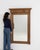 This mirror makes its impression through natural honey oak, turned column. The piece dates to 1900s, sourced from France,...