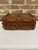 A striking example of American folk art craftsmanship, this antique Tramp Art lidded box features intricate, multi-layered...