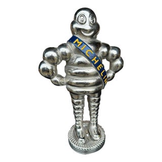Michelin Man in Silver Cast Iron For Sale