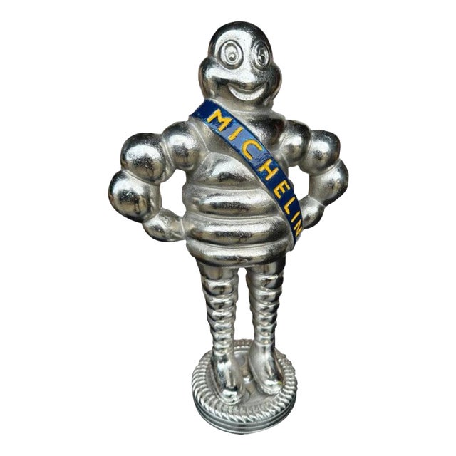 Michelin Man in Silver Cast Iron For Sale