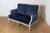 This 19th-century French Louis XVI-style sofa epitomizes elegance and timeless craftsmanship. The carved wood frame,...