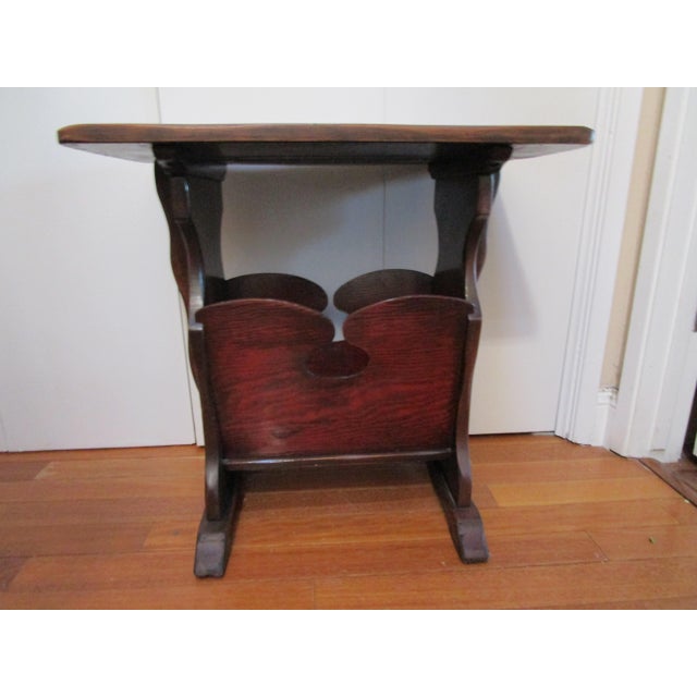 The patina of this charming Arts & Crafts side table with magazine rack makes it a standout. It is sturdy and well...