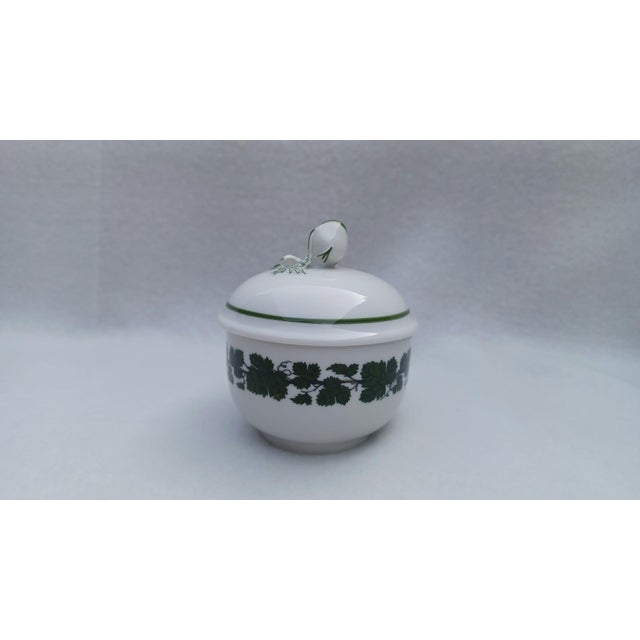 20th-Century Meissen Porcelain Miniature Sugar Bowl with Rose Bud Finial in 'Vine Leaves' Pattern This charming vintage...