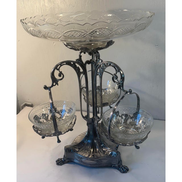 Lovely dramatic centerpiece epergne with crystal bowls.