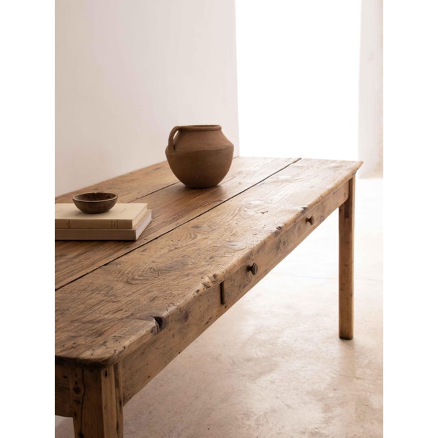 Gorgeous pine table with a large drawer front. Ideal size for a dining table. Recovered in Abruzzo and dating back to the...