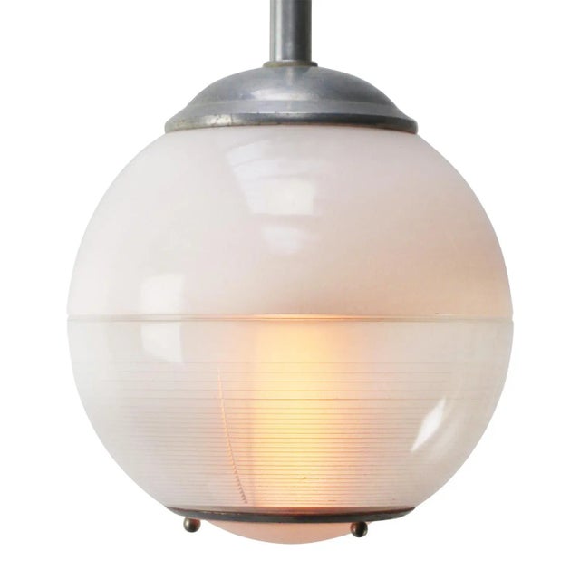 1950s glass pendant globe by holophane, paris, france. e27 / e26 this piece has an attribution mark, i am sure that it is...