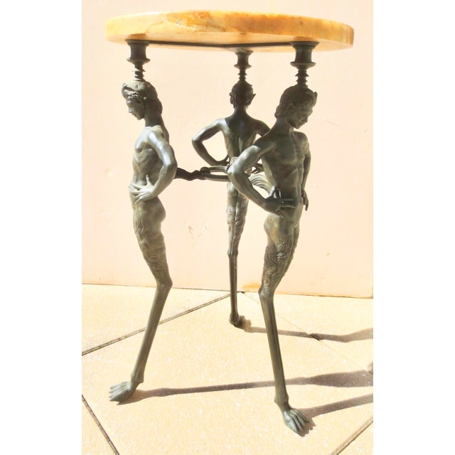 Fine bronze casting of a Roman bronze table reproduction of Pompeii discoveries. Modello del Braciere con gambe a forma di...