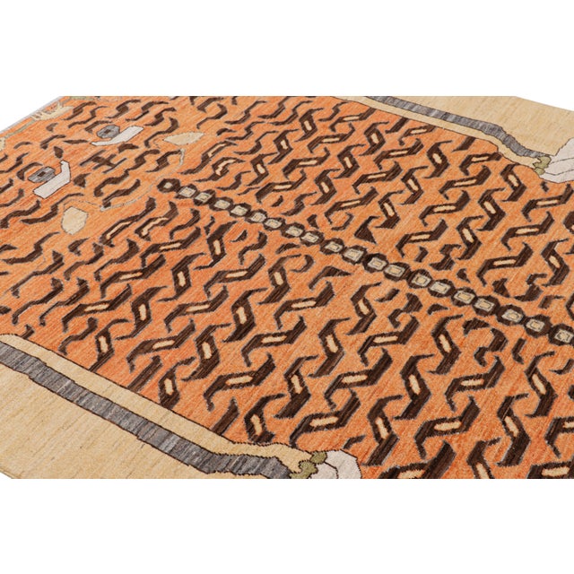 Hand-knotted in wool, this 6x9 modern tiger pictorial rug is a bold addition to the Rug & Kilim exclusive Tiger line. On...
