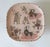 Vintage light pink Italian cake stand with wine making motif. Signed Italy on bottom. Numbered. One chips on edge. Pictured.