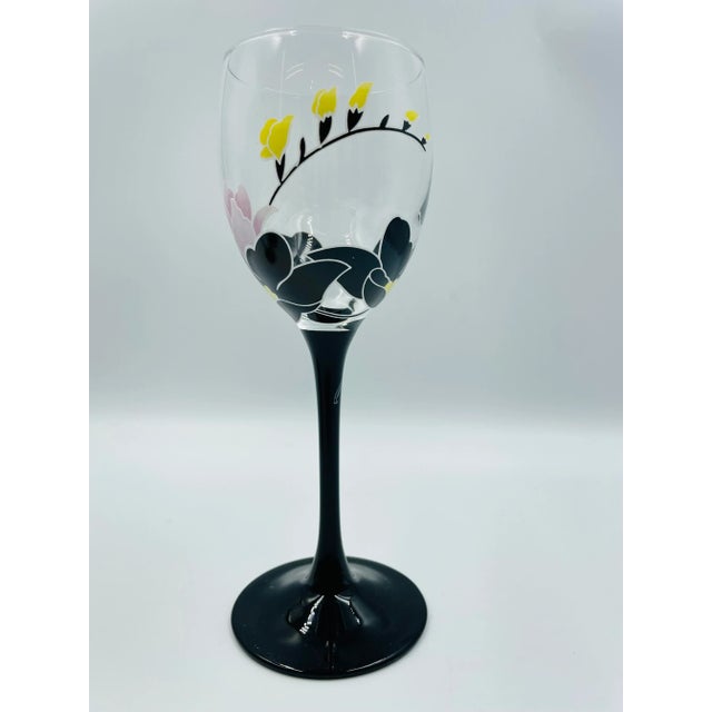 These floral themed stylish and sophisticated wine goblets were made in France. Each glass features a matte-finished bed...