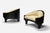 A pair of Henry P Glass intimate island lounge chairs Ebonized wood with upholstery Circa 1966 31.5D x 39W x 32H inches...