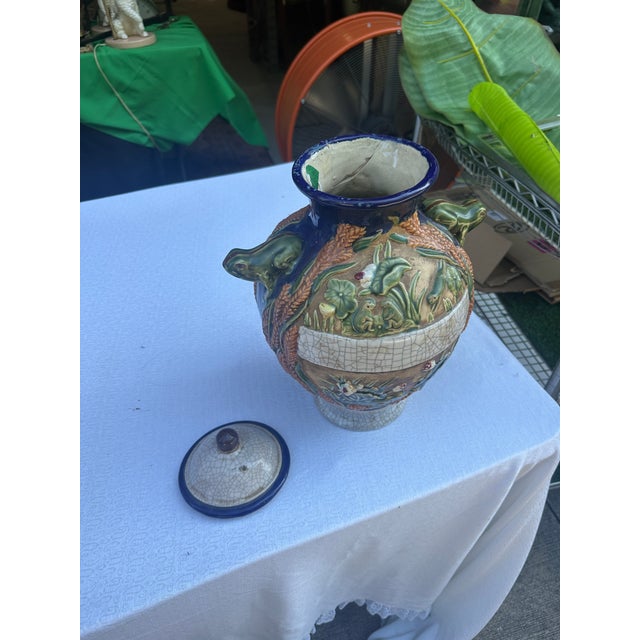Up for consideration is a beautiful vintage large ceramic jar with frog details. This would look lovely in your home, and...