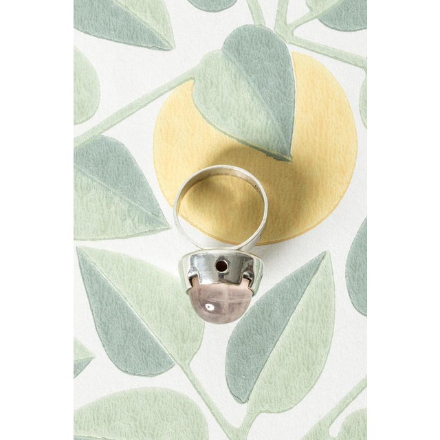 Cool silver ring by Martti Viikinniemi, in his signature design with a bullet cut rose quartz stone stone in diluted pink....