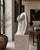 Striking 1980s vintage female bust sculpture hand-carved from solid white marble with natural gray and warm-toned veining....