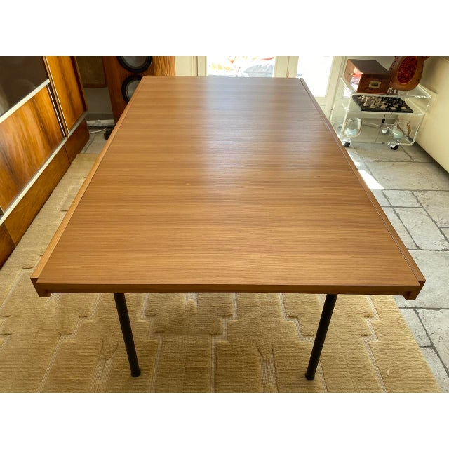 Gérard Guermonprez table, Magnani edition, 1960, elm with integrated 50cm extension, tubular metal base. 150/200cm long /...