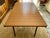 Gérard Guermonprez table, Magnani edition, 1960, elm with integrated 50cm extension, tubular metal base. 150/200cm long /...