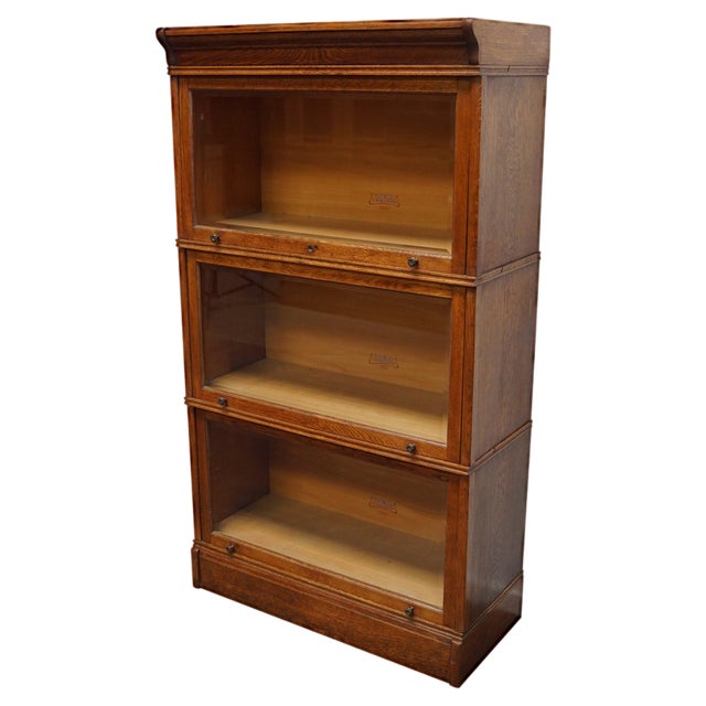 German Oak Bookcase with Folding Doors in style of Globe Wernicke, 1900s For Sale