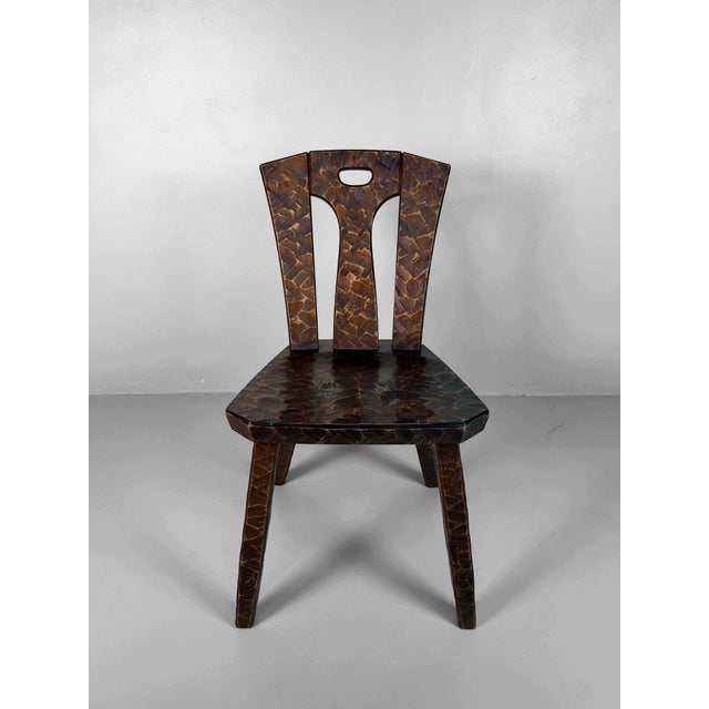 Distinctive japanese wooden chair dating from around 1950, featuring a sculptural design and pronounced wood carving in...