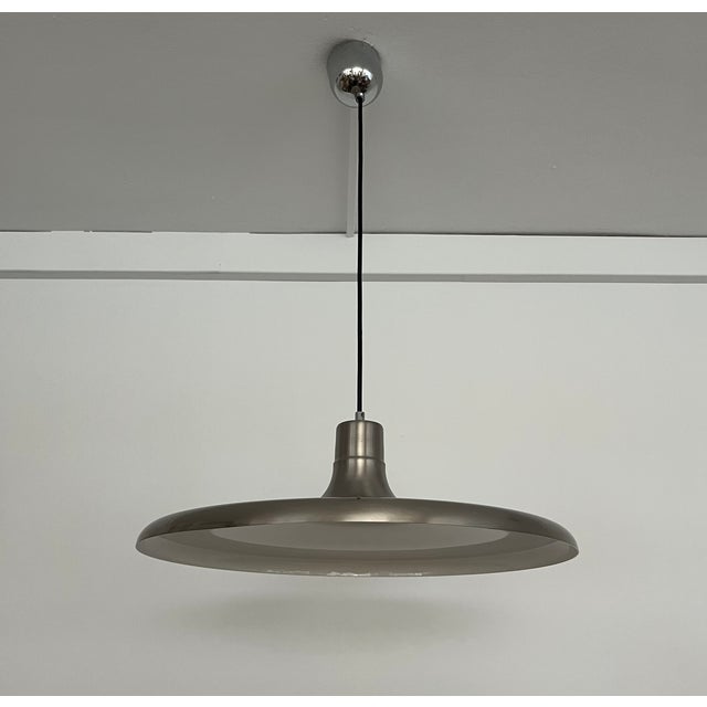 Beautiful mid-century metal spanish pair of chandeliers by leonardo marelli for estiluz. These fixtures were designed and...