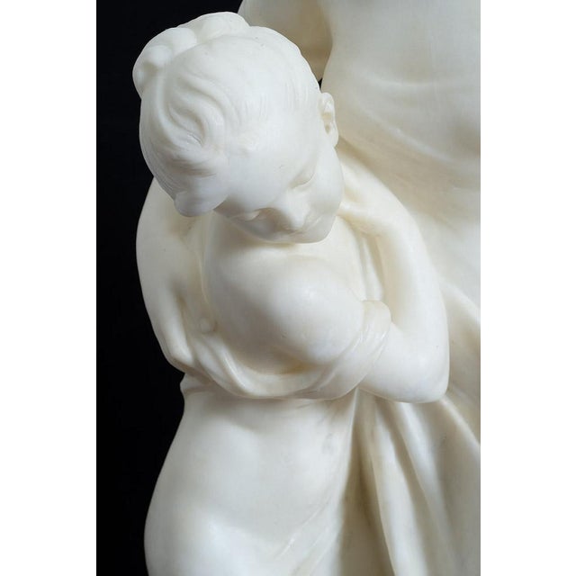 Description: An antique alabaster sculpture group dating from the Napoleon III period in the second half of the 19th...