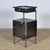 This iron nightstand, circa 1950, originated from a hospital. The old paint has been completely stripped, polished, and...