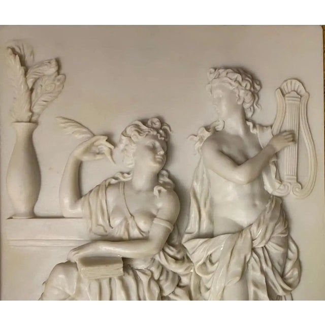 This captivating bas-relief framed decorative art, meticulously sculpted in resin, captures the essence of the Baroque...