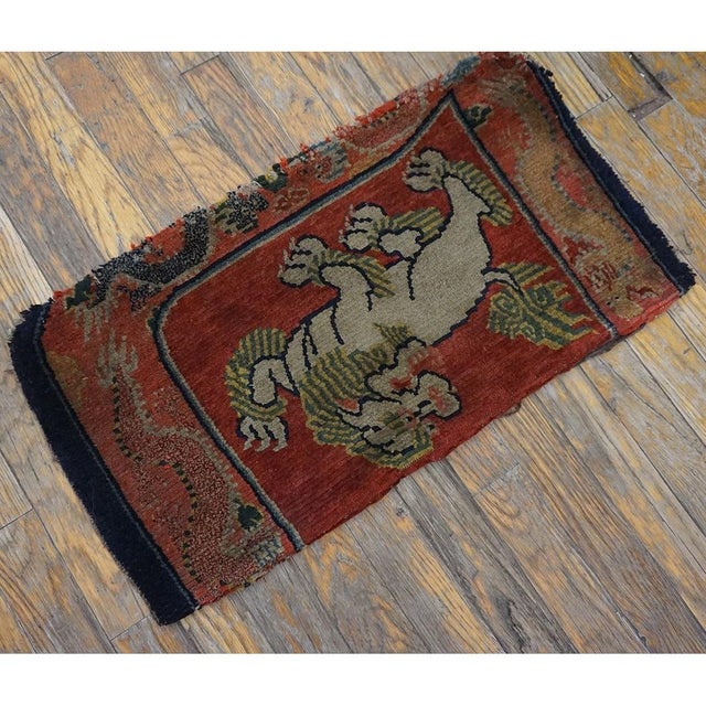 Antique Chinese - Tibetan Square Wool Red Rug, Circa Date: 1870s. This exceptional square piece exemplifies the unique...