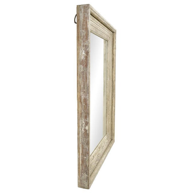 This antique mirror captivates with the rustic elegance of its patinated solid wood frame. Its deep moldings and nuanced...