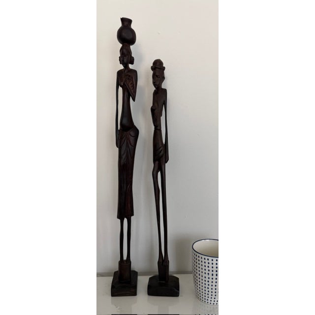 This set of two sculptures is unique. The two figures, though being of non-African appearance, are made in the tradition...