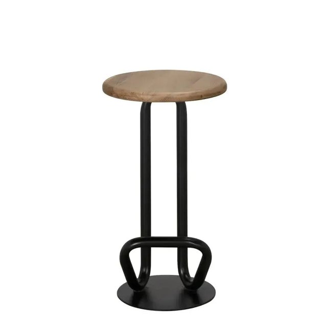 The Hook Counter Stool in Matte Black effortlessly blends industrial design with natural elegance. Crafted from industrial...
