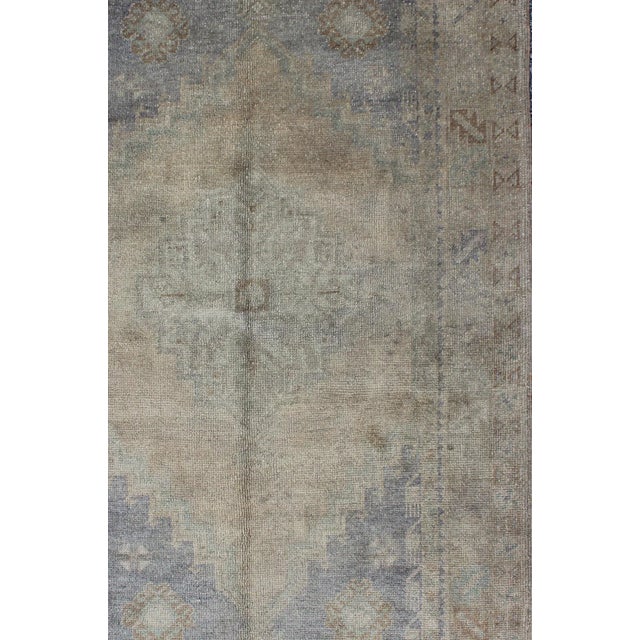 Vintage Turkish Oushak Rug With Muted Colors and Central Medallion Design For Sale - Image 4 of 7