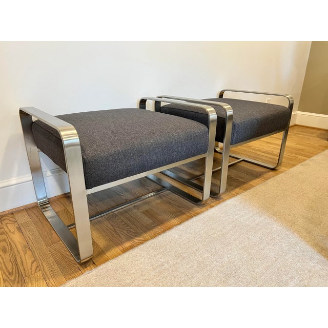 Pasha Furniture Axon modern ottomans. Dark gray linen-look polyester fabric cushion with brushed stainless steel frame.