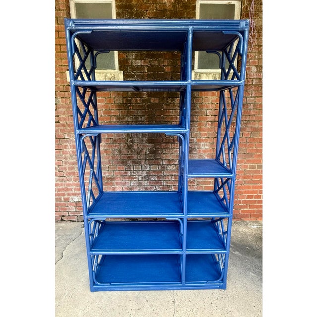 Elevate your living space with this stunning vintage Chinoiserie Chippendale style bookcase, newly transformed in our...
