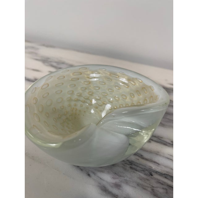 This Ashtray is a stunning and luxurious piece that reflects the artistic mastery of Murano glassmakers from the mid-20th...
