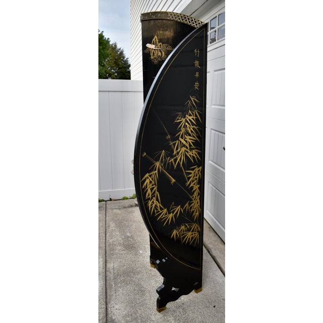 Vintage (1970s) 4 Panel Room Divider/Screen has a Chinese Style. Made of Wood with a Black Lacquer Finish and Raised...
