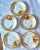 Set of Five (5) early 1900s Hand Painted Nippon porcelain plates. Beautiful poppies adorn these plates with raised gold...