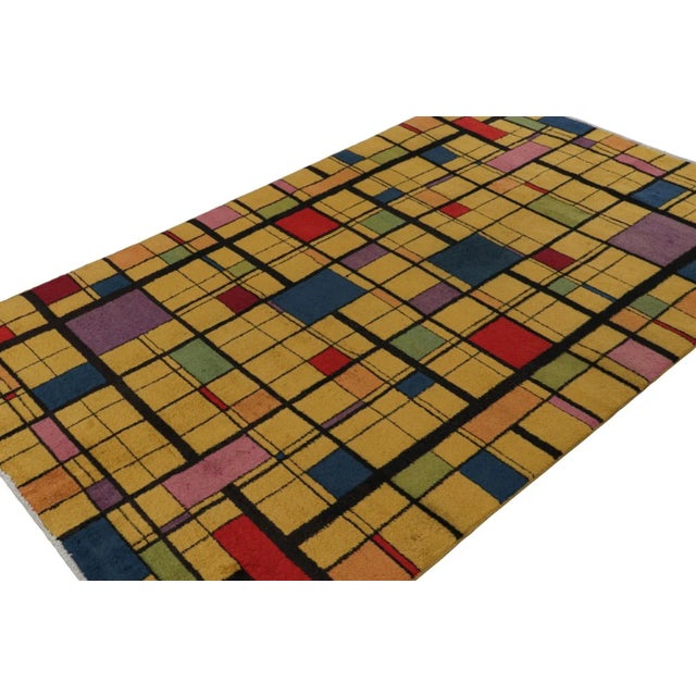 Hand-knotted in wool, circa 1960 - 1970, this 5x8 vintage Müren Art Deco rug is an exciting new addition to Rug & Kilim...