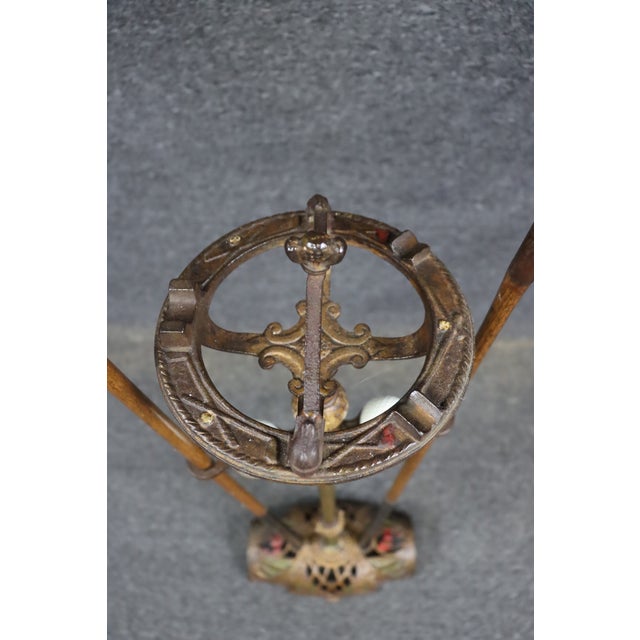 An antique Parlor Putter smoking stand by Chicago-based Wellington Stone, originally produced between 1920 and 1925....