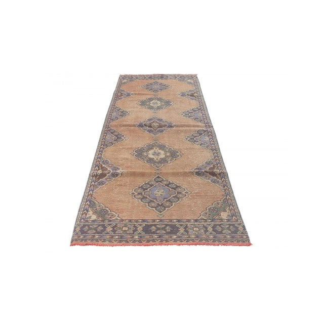 Decorative washed out handknotted vintage rug from Konya region of Turkey. Approximately 50-60 years old. In very good...