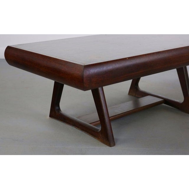 Walnut end tables in a unique minimalist design a great design mid century or Asian aesthetic.