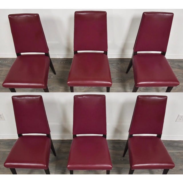 A beautiful set of six well made mid century modern dining chairs in the original purple vinyl and ebonized frames in the...