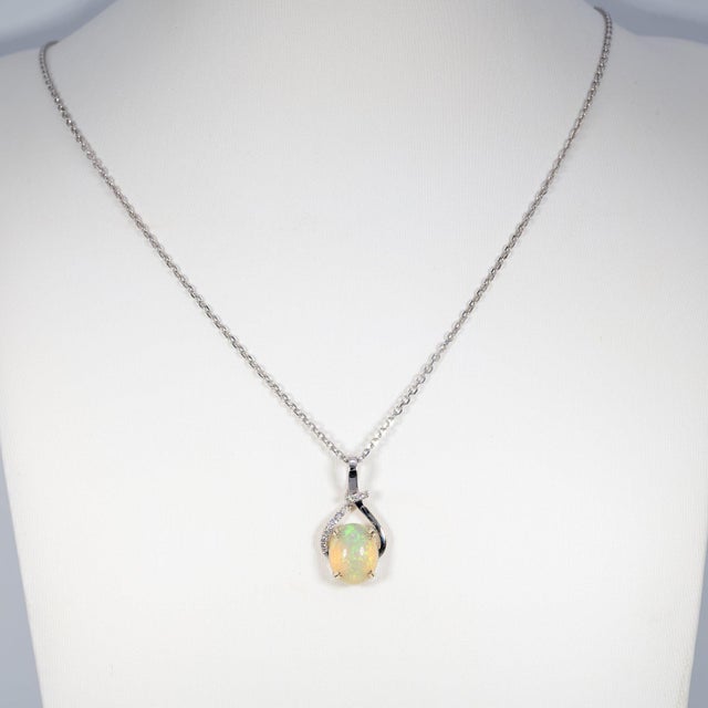 1.8Ct Ethiopian Opal Pendant With Natural Diamonds: Solid 14k Gold, Oval 10x8mm For Sale - Image 4 of 7