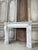 Louis xvi style fireplace in white carrara marble, circa 1890. The straight jambs feature a wide console or scroll. A...