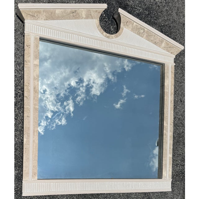 Elegant and rare Neoclassical style wall mirror by Maitland Smith. Made of wood structure with tessellated stone and...