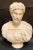 Graceful bust sculpture made of rich carrara white marble, finely depicting a Roman emperor. Made in Italy in the late...