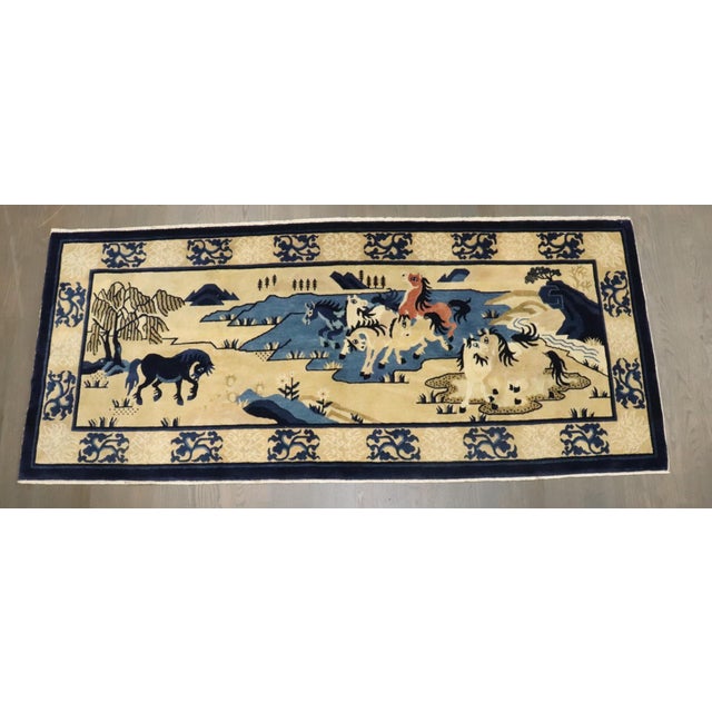 A mid 20th Century Chinese Peking Horse Rug