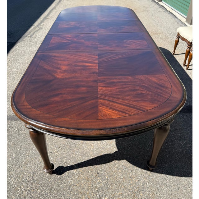 Hooker Furniture 1 Leesburg Oval Dark Wood Dining Table Dimensions: 76-112"W x 44"D x 30.25"H 2 Leesburg Mahogany Wood...